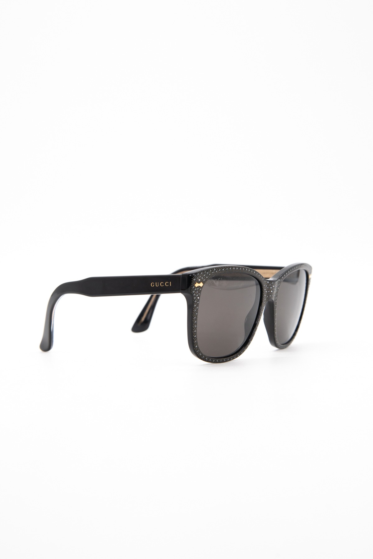 Gucci Sonnenbrille mit Strasssteinen in Schwarz und Gold