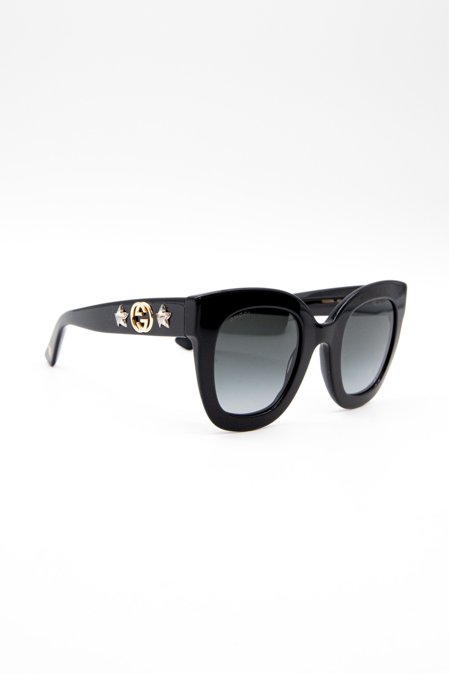 Gucci Sonnenbrille mit Strasssternen in Schwarz