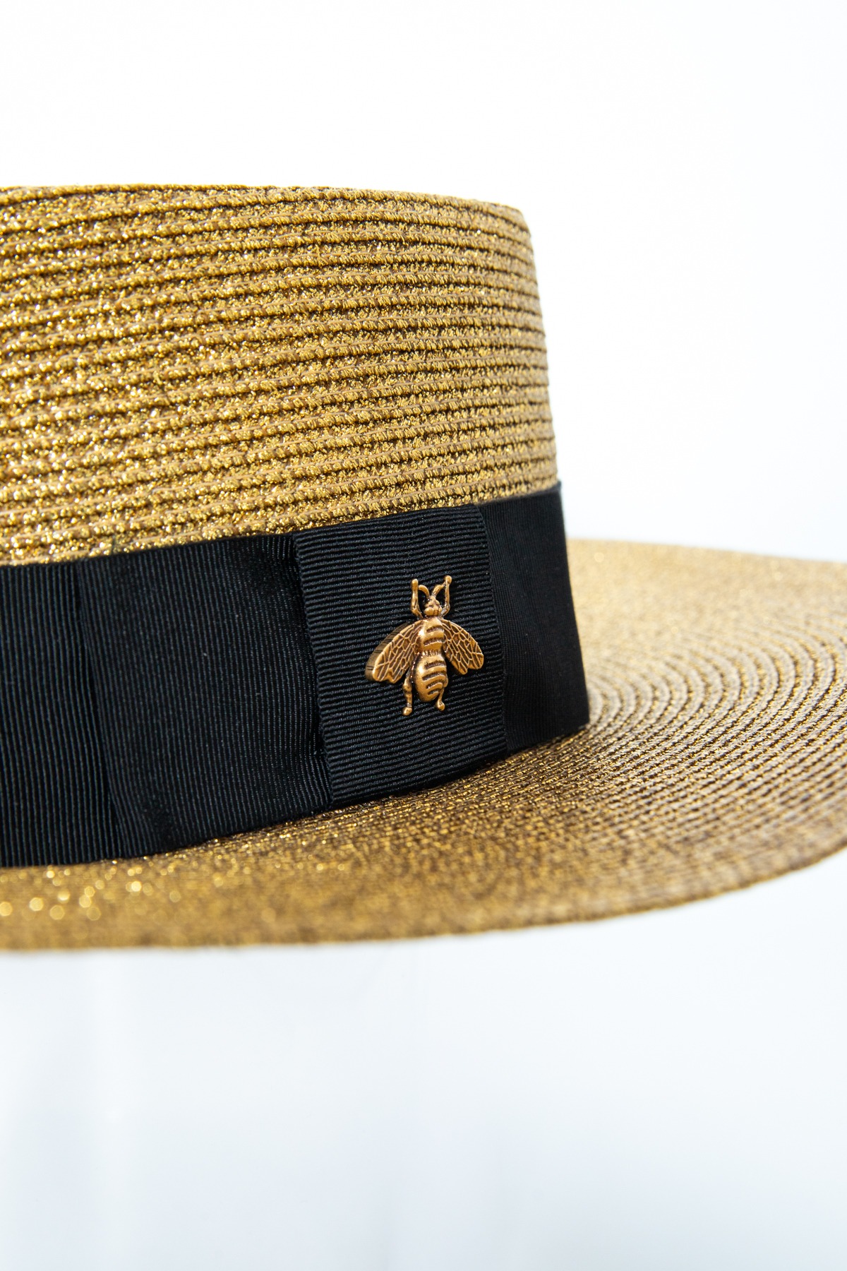 Gucci Hut in Gold und Schwarz