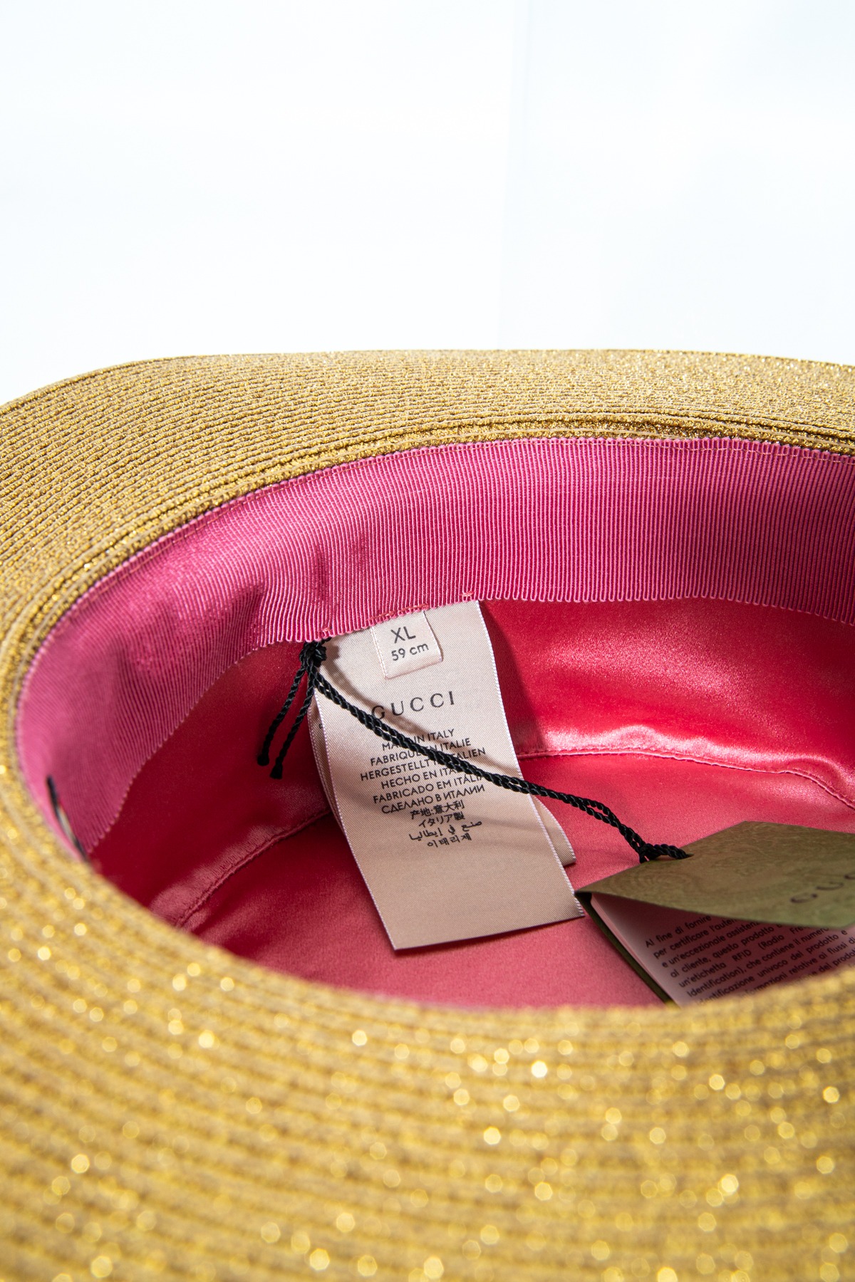 Gucci Hut in Gold und Schwarz
