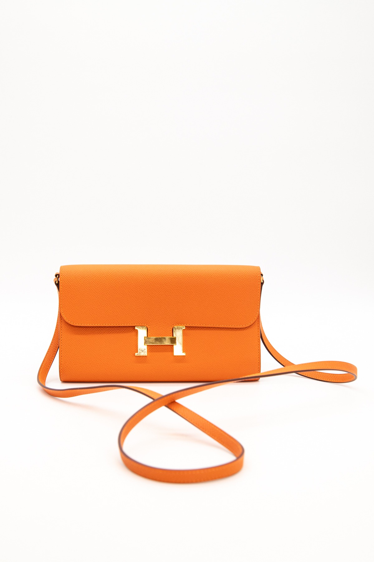 Hermès "Constance To Go" Clutch in Orange und Gold