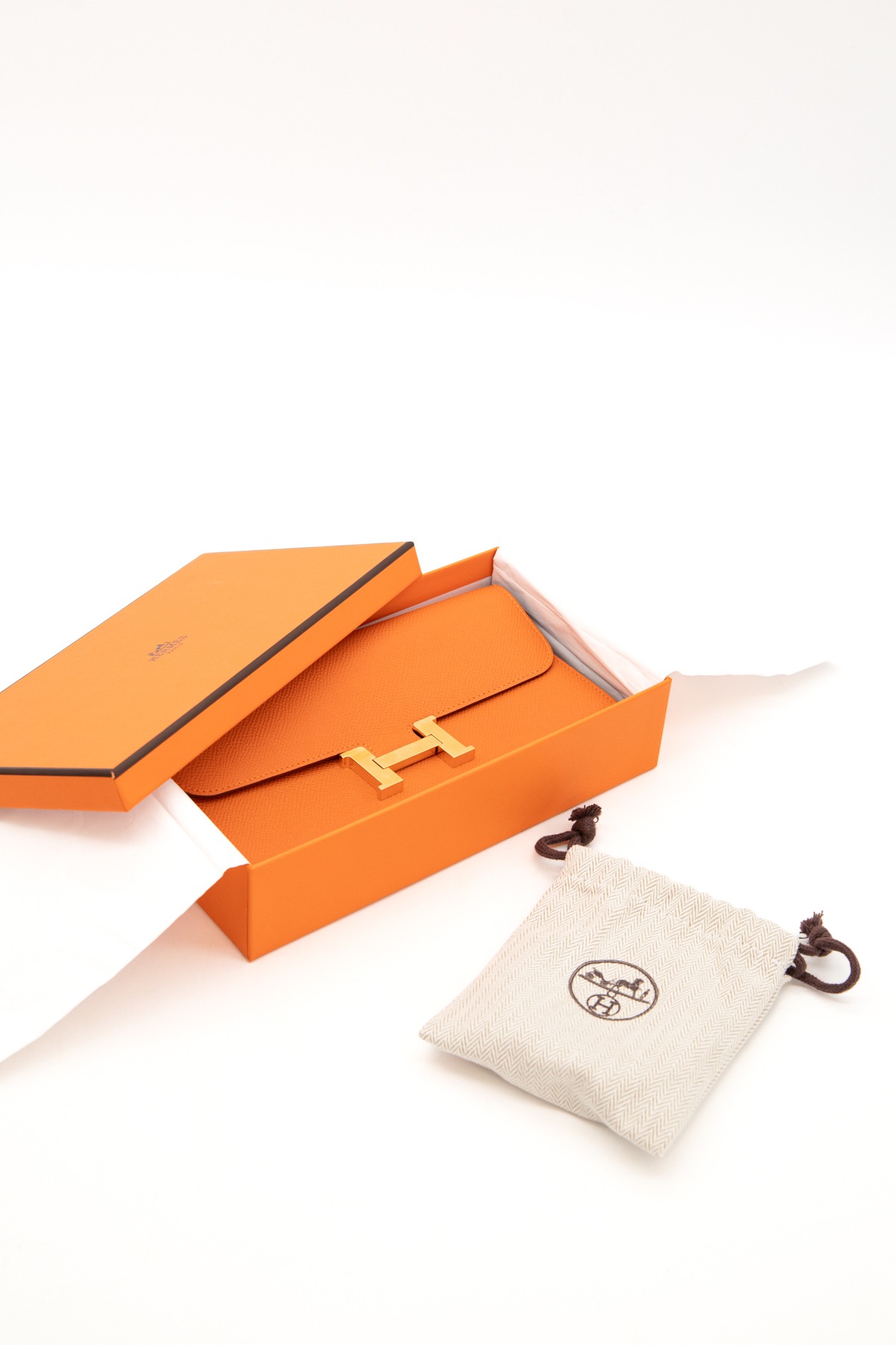 Hermès "Constance To Go" Clutch in Orange und Gold