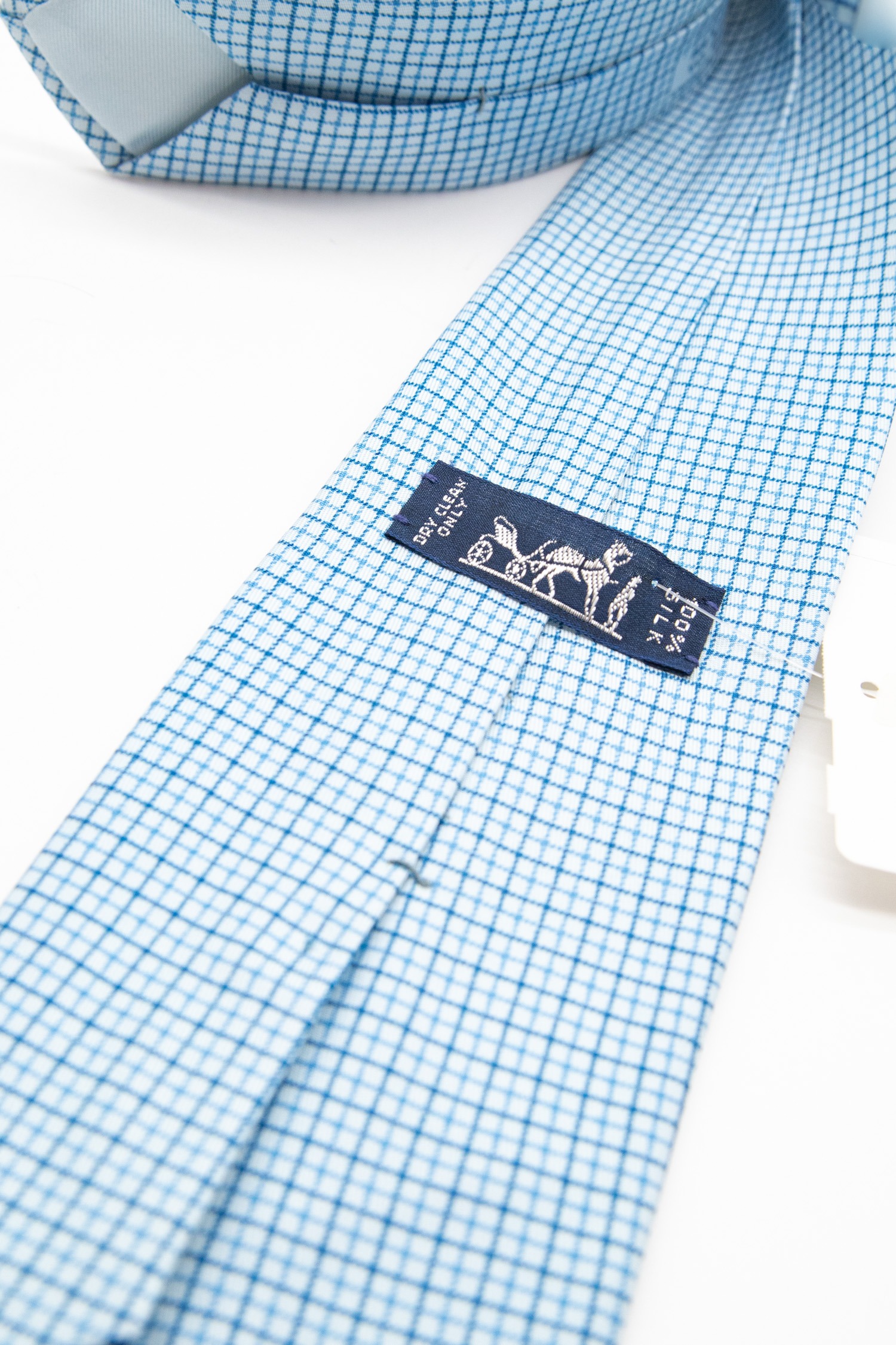 Hermès Krawatte mit Karomuster in Hellblau und Blau