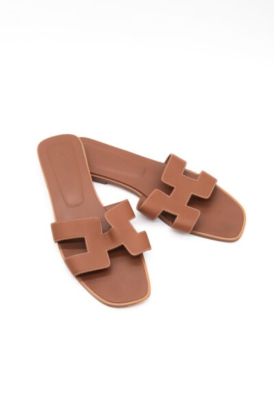 Hermès „Oran“ Sandalen in Hellbraun
