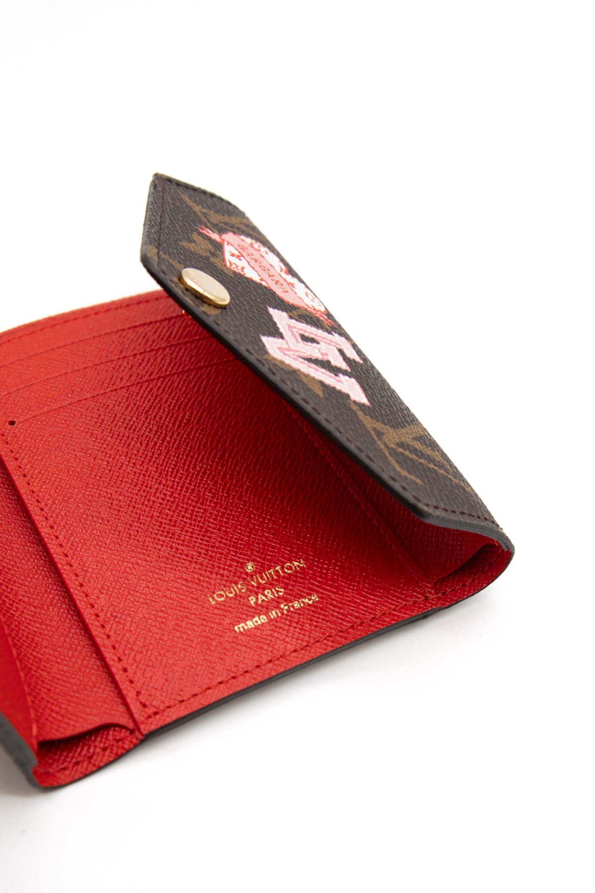 Louis Vuitton "Victorine My LV World Tour" Portemonnaie in Braun