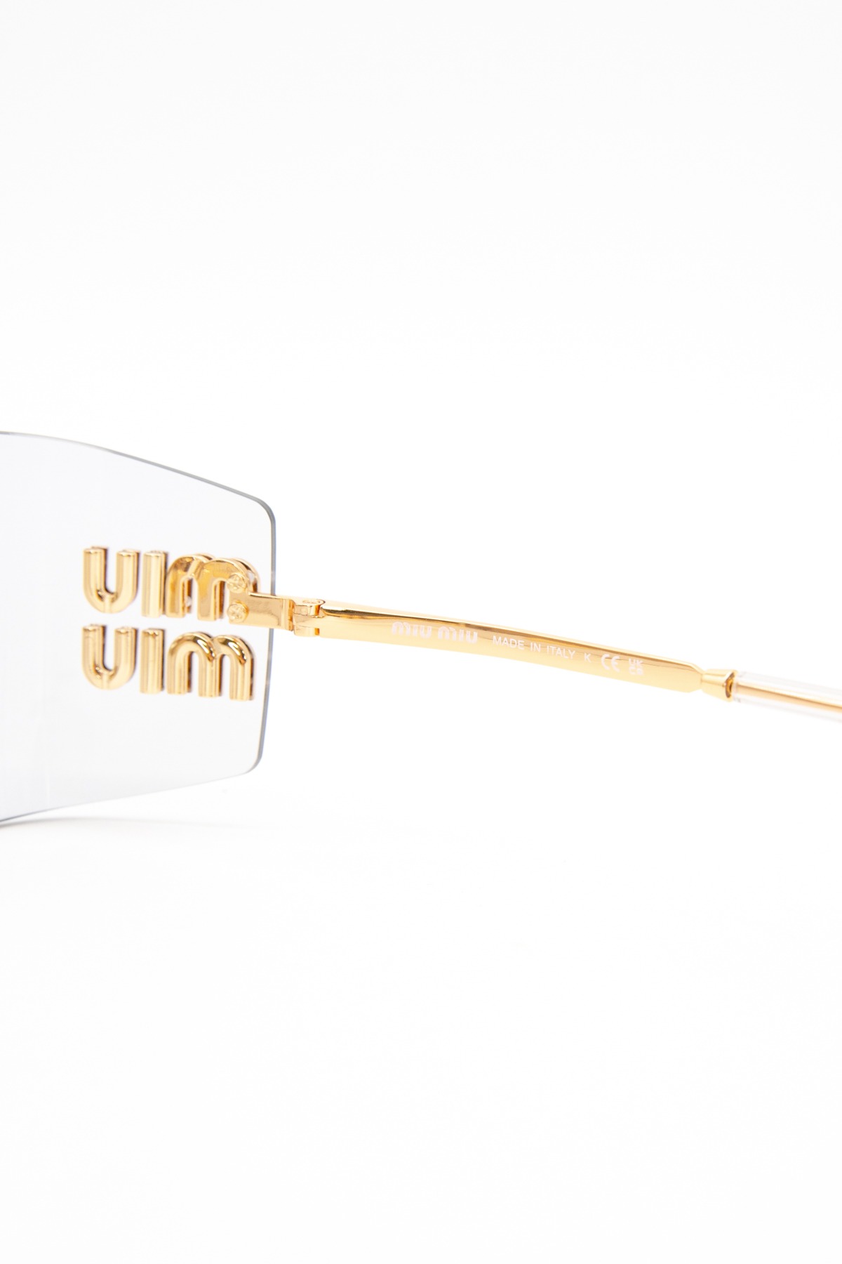 Miu Miu "Aube" Sonnenbrille in Gold und Transparent