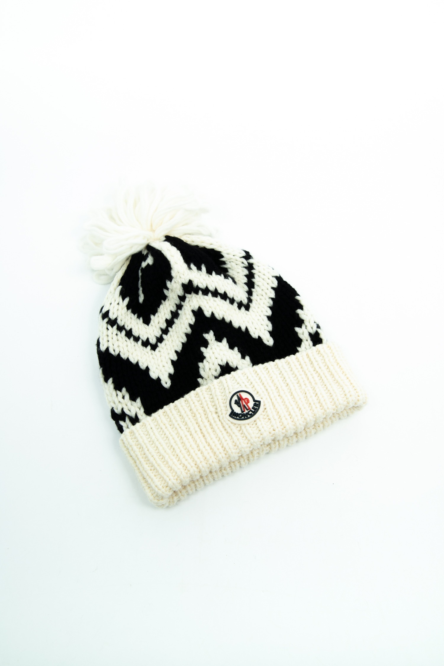 Moncler "Berretto Tricot" Strickmütze mit Bommel in Ecru und Schwarz