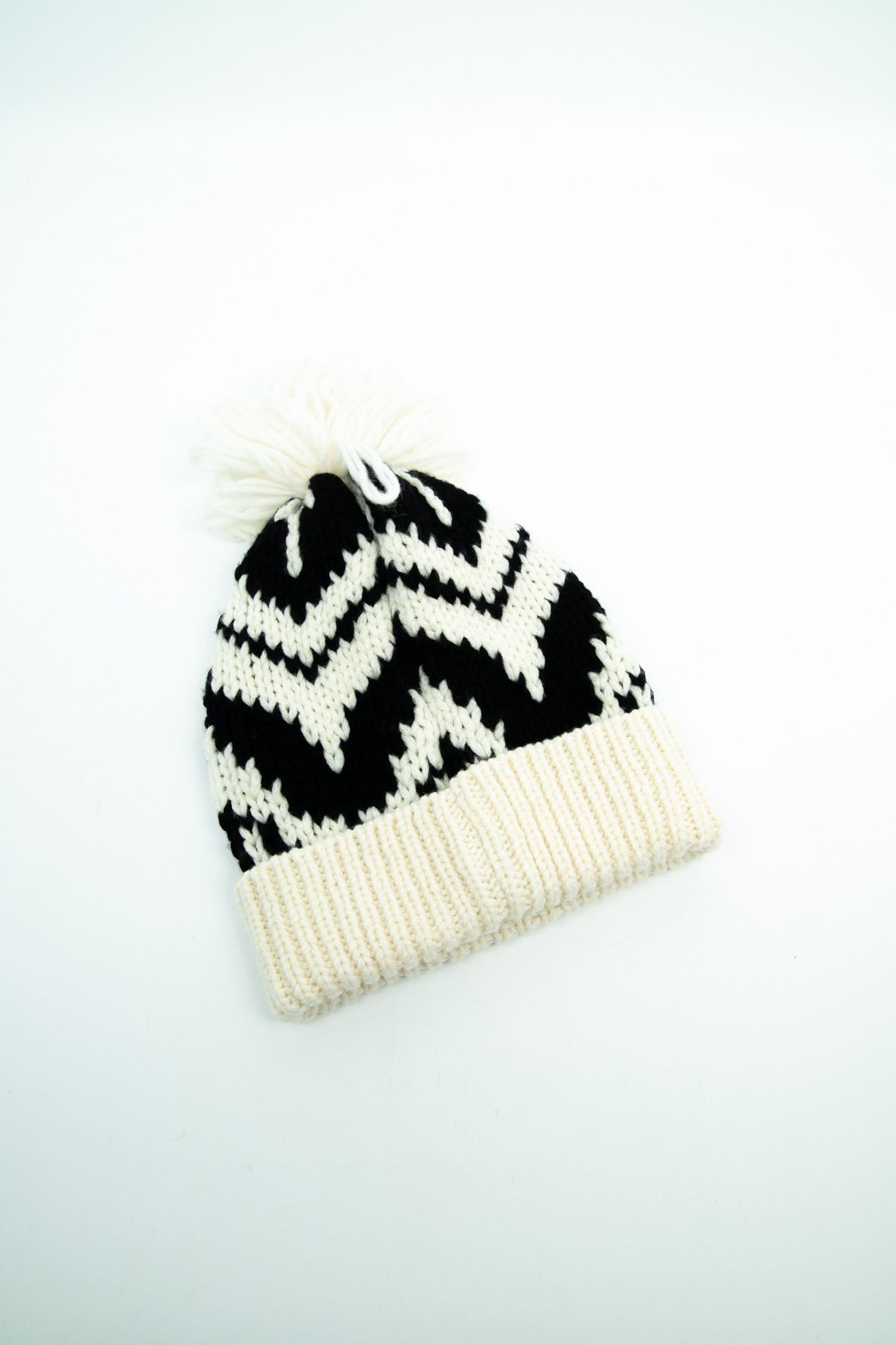 Moncler "Berretto Tricot" Strickmütze mit Bommel in Ecru und Schwarz