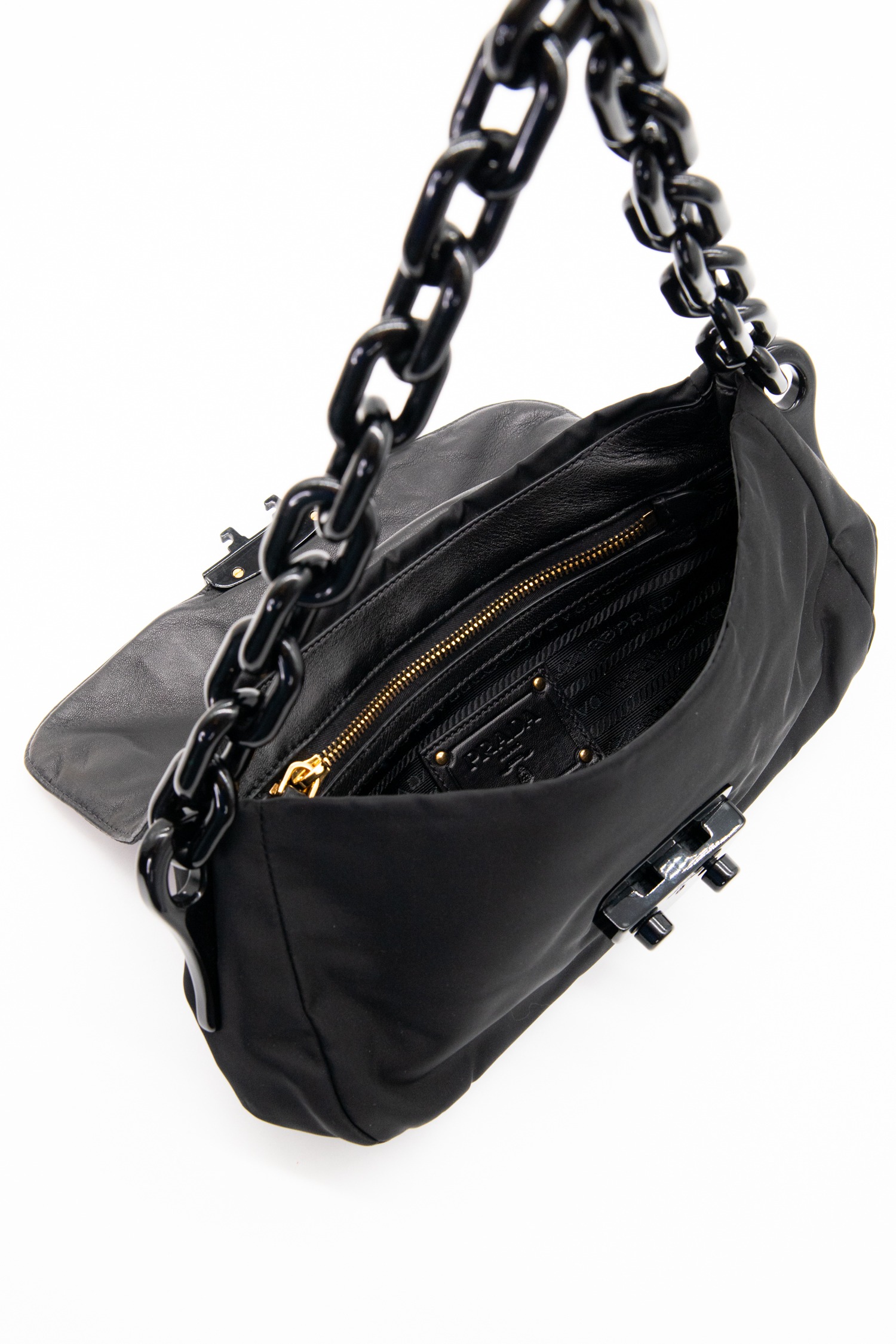 Prada Handtasche mit Schmucksteinen in Schwarz und Gold