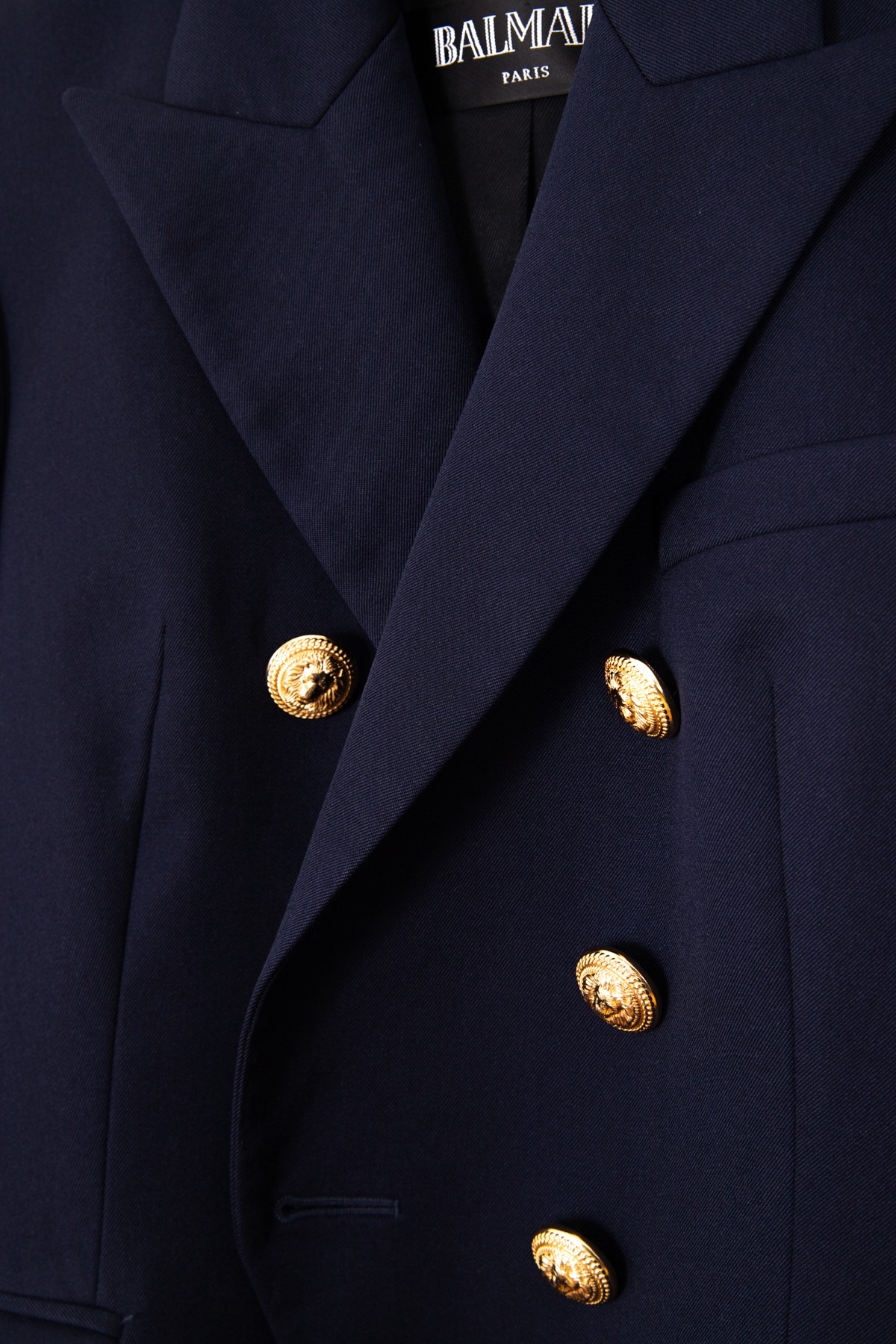 Balmain Blazer aus Wolle in Dunkelblau und Gold