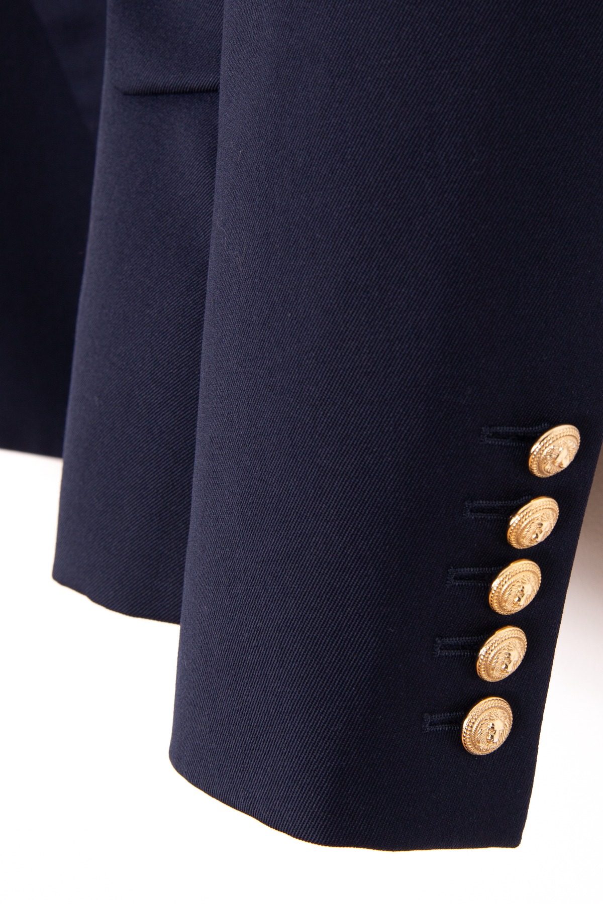 Balmain Blazer aus Wolle in Dunkelblau und Gold