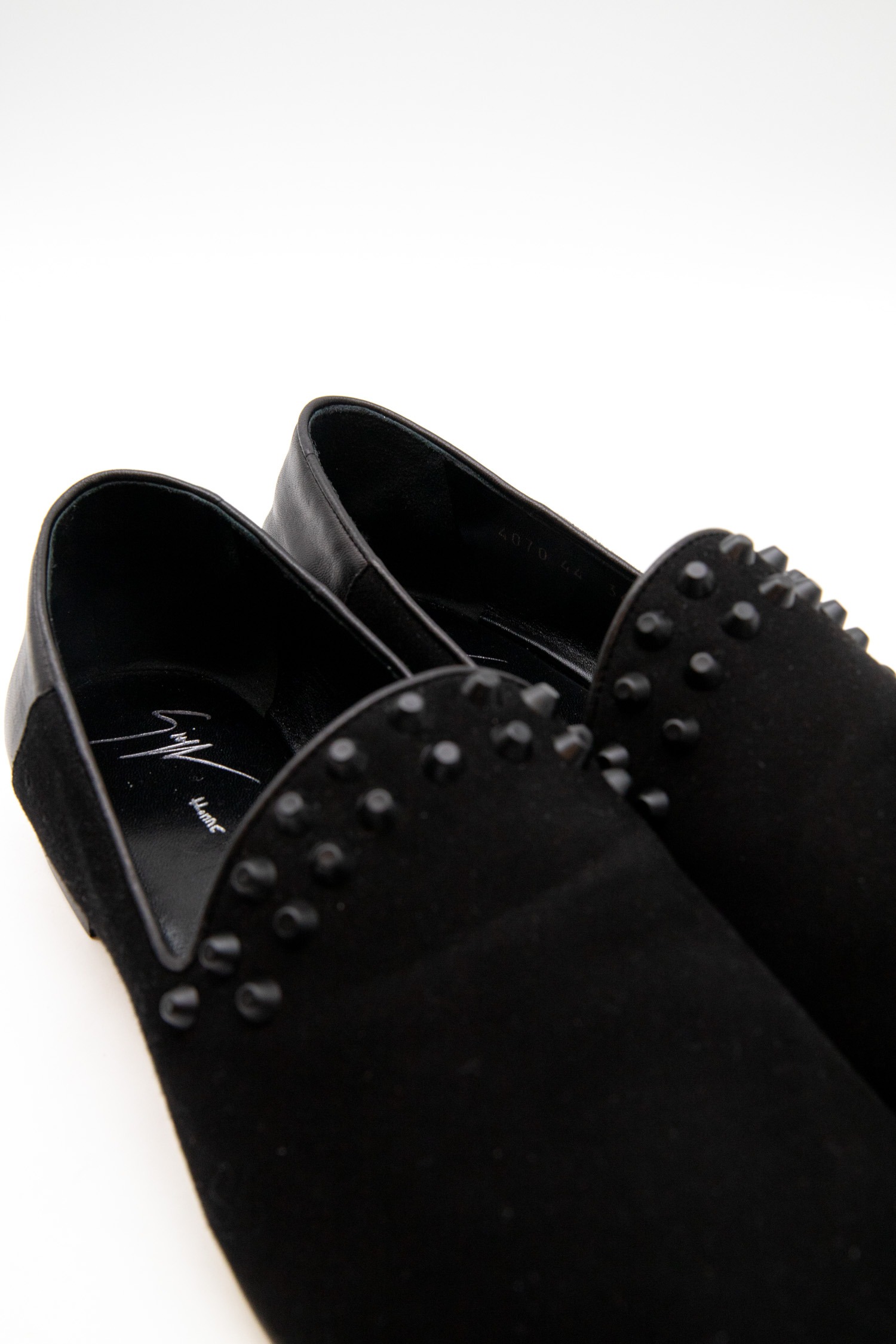 Giuseppe Zanotti Slipper mit Nieten in Schwarz